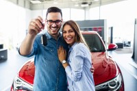 Couple Standing in front of Car.jpeg